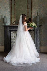 Bride showcasing wedding dress for wedding at wynyard hall 